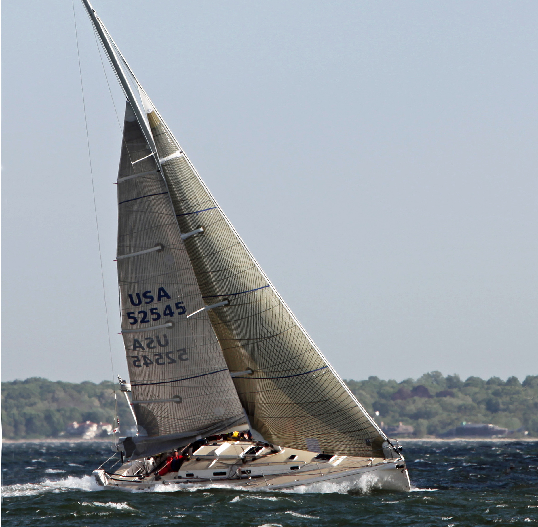 The J/133 Antidote with a double-reefed main and No. 4 genoa going to windward in 40 knots of wind. Allen Clark image/www.photoboat.com