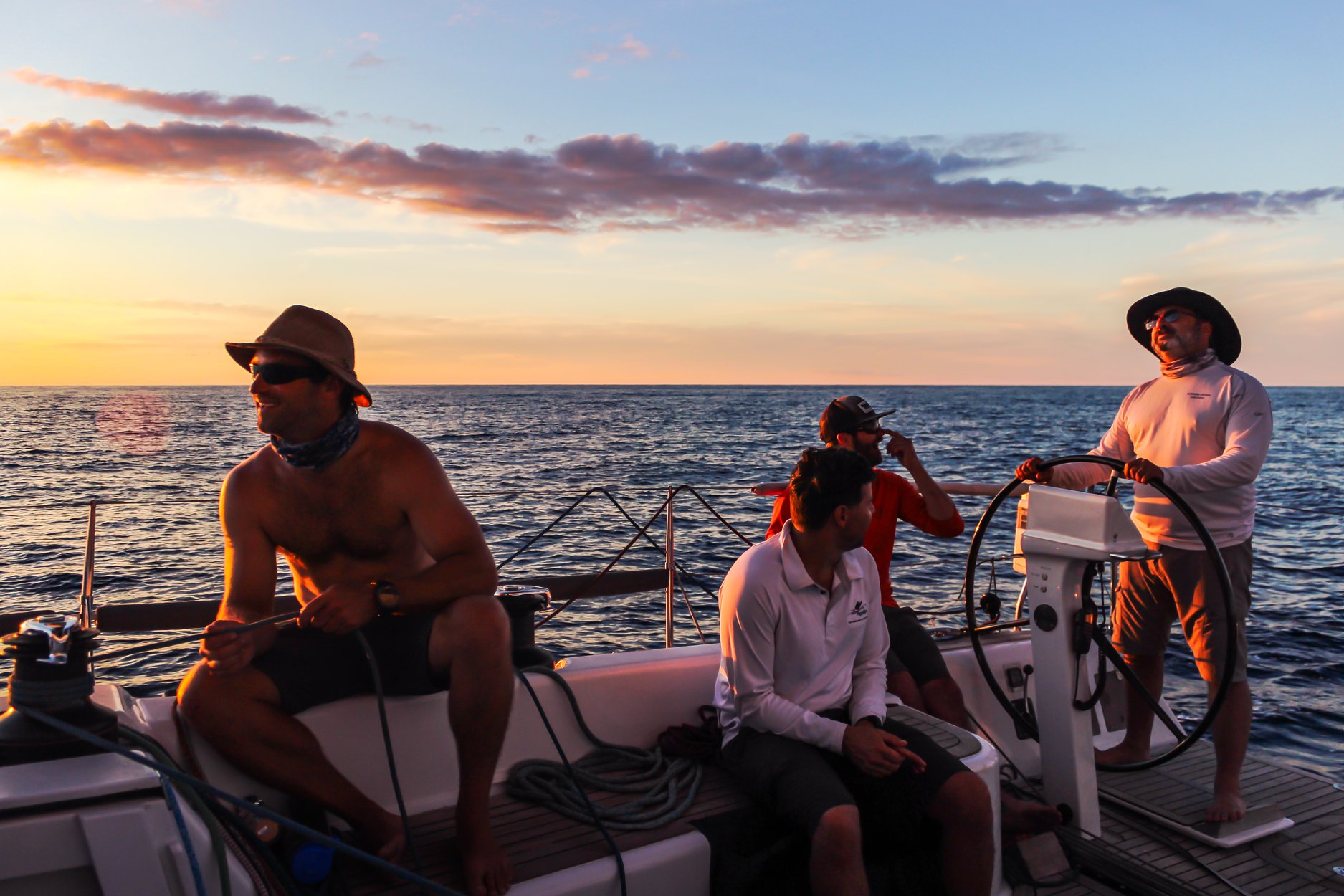 Light winds dominated the 2018 Newport to Bermuda Race. Shown here is the starboard watch on the Marten 49 SUMMER STORM. From the wheel forward: Andrew Berdon, Alden Winder, Ben Cormack, Walker Potts. Josh Reisberg photo.