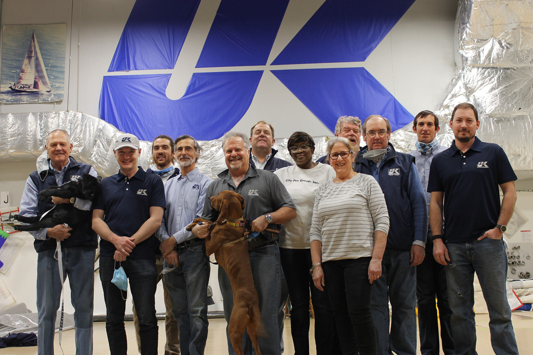 L to R: Butch Ulmer, Ryan Zupon, Nick McGhee, Adam Loory (UK International), Conny and Jasper Baris, Kevin Crouchley, Susan Mottley-Smith, Mayann Weinberg, David Martin, Larry Winant, Emmett Dickheiser and Mike Colarusso.