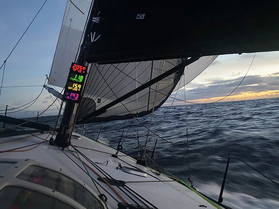 Westerly Spinnaker and staysail at sunset sm